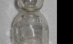 This ad is for an old glass milk bottle, one quart, no cracks, no chips, no crazing, no holes, dirty and needs to be cleaned, Forest Dairy, North Arlington, NJ, found cleaning out my barn (in Callicoon Center, New York), measures approximately 3 3/4"