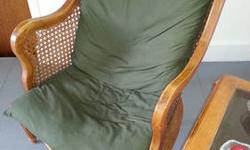 Good strong chair. Solid wood frame with wicker accents. The cushions can be removed. 25 inches wide, 24 inches deep, 32 inches tall. It is from a no pet, no smoking home. Asking $35. You can contact me by email or phone me at 518-772-1845. Thanks.