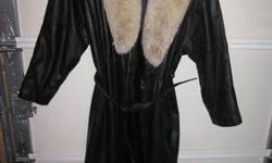 Nice full lenght black leather coat with fox fur collar, size 1x-2x in very good condition.Soft and Warm. 100.00 or best reasonable offer. Have a good day.
