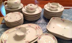 We are moving and downsizing and I am selling my grandmothers G Schonwald German china set in a very sweet flowered pattern, SCD139 by Schonwald, all pieces are in great condition and totally useable. Here are the details about the set.
- 21 dinner plates