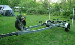 Galvanized roller trailer, with raised lights on PVC guildes and LED lights. Everything is heavy duty, 5000 lb. axle and newer 16.5 inch rims and spare. Has been used the past few seasons to trailer a 22 ft Mako. New bearings and races, fenders and