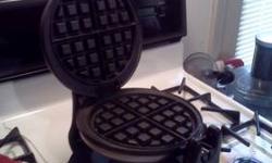 Got last year for Christmas and has only been used twice since.
Makes 1" thick, 6 3/4" round waffles, 950M, brushed stainless steel design, rotating system for even baking and browning, non-stick coating for easy cooking and cleaning, compact size for
