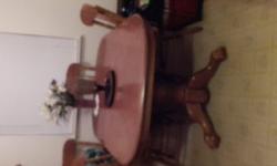 Oak dining table seats 4, but has a Hidden leaft n opens in the middle to seat up to 6 people. Call/text (845) 728-2734.