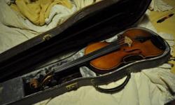 I have a beautiful German made reproduction Stradivarius violin. Built in 1952 by KH. It is in perfect shape not a scratch. Beautiful wood grain and color. comes with hard case two bows rozin and a shoulder rest. also its strings are new
