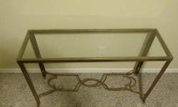 Metal Glass Top Table
Color: Gold
This table is in excellent condition. It has welded metal framing
Approximate Measurements:
46" Long x 14.5" Wide x 30" Tall.
The decorative base piece is 6.5" from floor.
