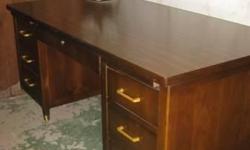 Rare Globe Wernicke steel tanker desk. This desk is in very good condition. During World War II, Globe Wernicke started making office furniture for the military. Afterwards, these desks found there way into businesses around the world. Today, there super