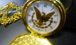Gold Tone Pocket Watch
Approx. 1 15/16" Diameter - excluding crown
Large Fancy Onion Crown
12" Gold Tone Chain
Watch runs but sold "As Is"
Accuracy has not been determined
No information regarding material of construction
Not antique. Not gold plated.