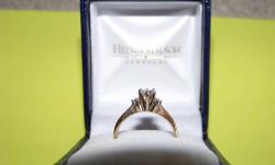 A brand new Engagement ring, still in box - 14 Kt Gold - .33rd w/ 2 = .06 SI clarity... This was purchased from Henry Wilson Jewelers. Was never worn. Gorgeous ring for the perfect woman in your life... Must see to appreciate.