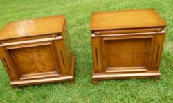 This is a beautiful pair of mid century nightstands or bed side tables. They have 2 drawers and a very useful top shelf that pulls out. There are also brass accents and there is gorgeous burl wood on the drawers. The night stands are about 23" wide x 15