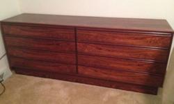 Beautiful gleeming medium dark stained solid rosewood, Clean-lined 70's Scandanavian import in excellent condition. All drawers are dovetailed. 27 1/2" H, 18"D, 71 1/2"L. A piece like this is hard to find. Pick up only