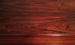 Beautiful gleeming deep color rosewood, Clean-lined Scandanavian import in excellent condition. All drawers are dovetailed. 27 1/2" H, 18"D, 71 1/2"L. A piece like this is very difficult to find. Make offer.