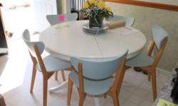 This kitchen set comes with the table and matching chairs. I have had the set for only a few years and it is in perfect condition. If interested, please let me know.
Thanks.
