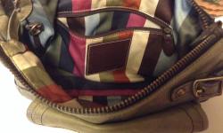 Pre owned hobo bag. Need a to be cleaned has some water stains, but in good condition. Please txt me 845 421 7684 or email me