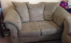 Living room set in good-to-great condition! Set includes a couch, loveseat, large chair and ottoman. Fabric is in good condition on all pieces. Couch has lost some support in the middle, loveseat and chair have good support still. Comes from a pet-free