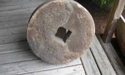 Old antique Grist Mill Stone.. Square center measurements are 22 in. by 22 1/2 in. by 4 1/2 inches wide.