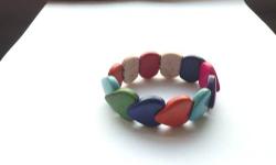 Beautiful earthy rustic multi-colored or turquoise
12 beaded heart shaped stone stretch bracelet, fits most wrist sizes
individual stone size approximately 3/4 inch wide
bracelet - unstretched 2.25 inch in diameter
available multi-colored or turquoise