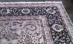 Beautiful Traditional wool rug. Background is beige. Border background is navy. Flowers in rose, tan, greens, navy, tans. Very neutral. Goes with everything. Excellent condition. $11,250 price when new.
If you need help with pick up and delivery you can
