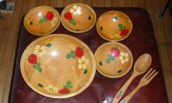 Beautiful hand-painted salad bowl set. Includes large salad bowl, four serving bowls, and serving fork and spoon. Some paint chipped off the bottom of bowls, but hand painting is in great condition. I bought this set at the antique show in Clayton years