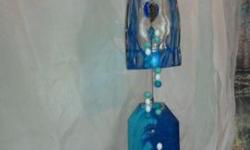 wind chime. made with drift wood, shells, beads and a beautiful glass center piece
I am located in Honeoye, I can meet within reason. if you don't live close by we can arrange to ship it with seller paying all shipping costs. All payments in cash or