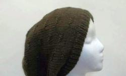 One size fits all. This knit beanie slouch hat can be worn by men or women. Great for any hair style, color, type or head size. The color of this hat is olive green wool color. It is made with a soft pure wool yarn. It is a medium thickness, very