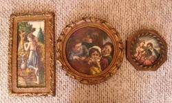 Vintage Artini hand-painted engravings.
Rectangular picture measures 16 1/2 X 9. It is a scene of a girl filling a water jug. The picture and frame are in great condition. The paper covering on the back shows aging. $30.00
The larger round picture