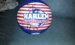 I have a 2003 Harlem Globetrotters 2003 World Tour. I have one of there balls signed by the players at the time and the book that was giving out at the game it has all the histroy of them it has pictures of some of the origanol players I will put some pic