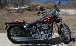 REDUCED - FOR SALE
2003 Custom Harley Davidson Soft-tail
Anniversary Edition and I have all the original parts, new tires,
all new Chrome and Harley Davidson Screaming Eagle Kit
Mint Condition -- A Must See! Asking $10,500 obo
Contact