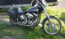2003 harley soft tail deuce, it is the 100 year anniversary and the deuce was only made for a few years. It runs and rides like new. Lots and lots of extra chrome, quick detach windshield and saddle bags. The bike is blue with silver stripes. The tires