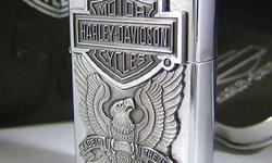 *** Brand new Zippo ***
This genuine Zippo lighter features an officially licensed, Harley Davidson Eagle. Both Zippo and Harley Davidson are USA manufacturers of fine quality products and this lighter is no exception. Take pride in the USA and buy a