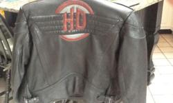 Women's Harley leather jacket. Like new. Size 40 (med) comes with removable faux fur collar.