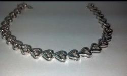 Heart Bracelet %50 OFF WHITE TAG SALE!!
14K Womens Heart Bracelet
.25Ct Diamonds
7.8Dmt 14K White Gold
Suggested retail price : $1000.00
Our Price : $500.00
This is only one of many pieces of jewelry we have for sale.
Come visit us at 9306 Linden Blvd
