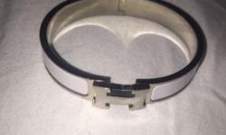 Silver and white lightly worn Hermes bangle
This ad was posted with the eBay Classifieds mobile app.