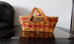 Green or Red Holiday Cheer Longaberger Baskets good condition each has hardwood maple top and plastic protector. The one includes a liner. Buyer pays all shipping costs in addition to the cost of the baskets. Red basket $60.00 each, Green basket with