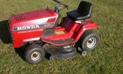 This is the classic Honda 2-cylinder liquid-cooled lawn tractor, considered by many to be one of the smoothest running and best lawn tractors ever made. This is the larger (and rarer) 42-inch cut with the three-blade deck, as opposed to the more "common"