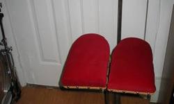 This Howard Wonder Seat is the original organ seat from the Chicago Uptown Theater.
The seat and back have been reupholstered from the original maroon velvet material to a beautiful red velvet. I have kept the original maroon velvet material, which will