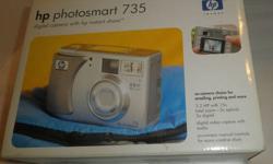You are looking at a new (never used) camera from HP.
specifications: contents:
3.2 MP Total resolution hp photosmart 735 digital camera
15X total zoom wrist strap
16 MB internal memory USB Cable for camera to PC
1.5 inchcolor LCD USB Cable for camera to