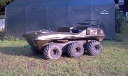 HUSTLER AMPHIBIOUS ALL TERRAIN VEHICLE.
THE HUSTLER IS COMPLETELY AMPHIBIOUS ATV THAT CAN HOLD 4 PASSENGERS, AND CAN FLOAT AND DRIVE IN DEEP WATER/MUD FOR EXTENDED PERIODS OF TIME. THESE ARE EXTREMELY MANEUVERABLE ON THE TRAILS AND CAN GO THRU/OVER ALMOST
