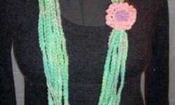 These handmade scarf/ necklaces are all under $20.00 each including shipping. We are selling these to raise funds to fight child abuse and hunger and are made by a group of volunteers.