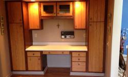 Complete Kitchen (excluding refrigerator). Woodmode solid wood cabinets (2-tone), formica counter top, and General Electric Appliances - Stainless steel (Microwave oven, electric cooktop, electric wall over and diswasher).
- Woodmode Cabinets (circa 1978)