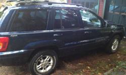 LOADED Jeep Grand Cherokee Limited 4.7 4x4 V8 Blue with Gray interior. LOADED with every feature including factory Navigation and Satellite Radio. Infinity Sounds System. Quadtrac Heated Power Seats. Body 2000, Motor is a 2002 Runs great. Great for the