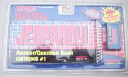Jeopardy! Hand Held Electronic Game Cartridge with Answer/Question Book
Works with Jeopardy! Handheld Electronic LCD Game Main Unit - Not included
By: Tiger Electronics 1995
Always be sure to Turn Off your Game Unit Before Inserting/Removing the Game