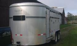 This is an awesome 4 horse all aluminum sturdy well built horse trailer in very good condition. Floor solid aluminum -has mats 4 horses will slant load nicely. Saddle rack in front and escape door-follows nicely-Everything works fine. Please call for