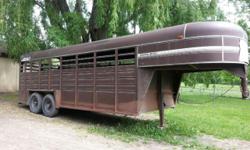 For Sale gooseneck 1991 Keifer Built horse/stock trailer. 20 Ft. Will fit up to 9 horses. New axle, all new tires and all new wheel bearings. Very solid trailer. Hauls like a dream. Solid floor. Plywood on walls for added protection. Storage up front. All