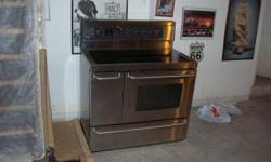 40" wide, two ovens, two years old, cannot fit in my kitchen without major cabinetry work. HOOD INCLUDED!!!! 22v plug, ready to go and cook!!! private party. Easy move to truck or trailer. NO STEPS.