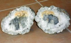 Keokuk Geodes-Medium Clear and Orange Quartz Keokuk Geodes from Fox Hills Missouri. Thousands of fine White Crystals throughout. Measurements 5? Wide and 3 Â¾? Tall. When 2 halves are combined around 6" x 5" These are both Deep Geode. These are a Pair, 2