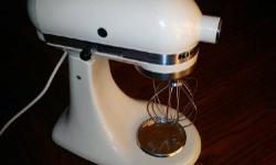 KITCHEN AID BLENDER-NO OTHER ATTACHMENT OR BOWL---$100.
NEVER USED BIG BREAD MAKER---$40.