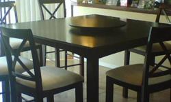 Counter height set, cherrywood "lazy susan" included, excellent condition, cost $1300.00 new