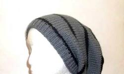 See all hand knitted hats and more at: http://www.CaboDesigns.etsy.com
The colors of this slouch hat are a medium gray with four black stripes. The beanie beret is made with a soft acrylic yarn. Very stretchy, will fit any head, stretches out to 31 inches