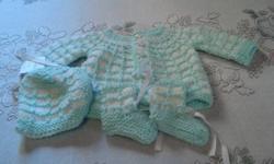 hand knitted by 84 year old woman. quality yarn used. 315-268-0078 shipping can be arranged.