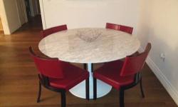This is a sleek Knoll Saarinen table for dining. It's in excellent condition (no scratches, etc). Chairs included at no additional cost.
Email for details.